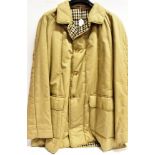 A GENTLEMAN'S 'BURBERRY' WAXED COTTON WEATHERPROOF NAVY COAT with check lining, size XX'; a