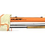 A 'GUIDELINE LE CIE' 14'8' THREE SECTION FISHING ROD with 'Guideline' cloth slip and carrying case