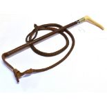 A LADIES HUNTING WHIP by Swaine, with antler grip, plated collar, plaited shaft and leash with lash