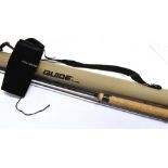 A 'GUIDELINE LPX' 12'6' THREE SECTION FISHING ROD with black cloth slip and 'Guideline' carrying