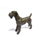 AFTER R. COOK, A RESIN FIGURE OF A STANDING TERRIER, 'SMUDGE' Height 28cm, length 26cm A/F