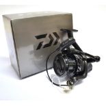 A DIAWA BLACK WIDOW 25A SPINNING REEL unused, with black cloth bag in original box