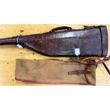 A GOOD QUALITY COMPARTMENTED LEATHER LEG OF MUTTON GUN CASE WITH BRASS FITTINGS FOR THE SMALLER BORE