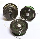 AN ORVIS SPEY FISHING REEL with line, diameter 10cm, together with two spare Orvis spools and