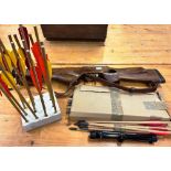 A CROSSBOW made in British Columbia in the 1980's together with a selection of arrows and