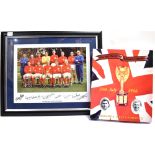 FOOTBALL ENGLAND 1966 WORLD CUP WINNERS A colour photograph of the team with the trophy and signed