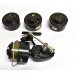 A GARCIA MITCHELL 410 SPINNING REEL with three spare spools in cases