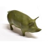 A PAINTED METAL FIGURE OF A STANDING PIG Length 17cm