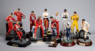 Collection of "The Art of Sport" F1 driver sculptures,  seven in original boxes, some with