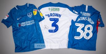 Three signed Portsmouth FC jersey's, comprising Gareth Evans blue and white no.26 home jersey,