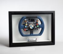 Framed replica BMW Williams F1 steering wheel, blue and black with coloured buttons, in a black