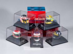 Group of 24 Minichamps 1:8 scale F1 Helmets, Including 6 from the Michael Schumacher collection,