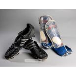Peter Crouch Adidas Traxion football boots, the black and silver boots bearing lettering PC to the