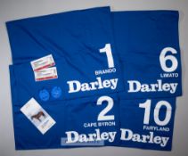 Four saddle cloths from the Darley July Cup at Newmarket 13th July 2019, the blue horse cloths