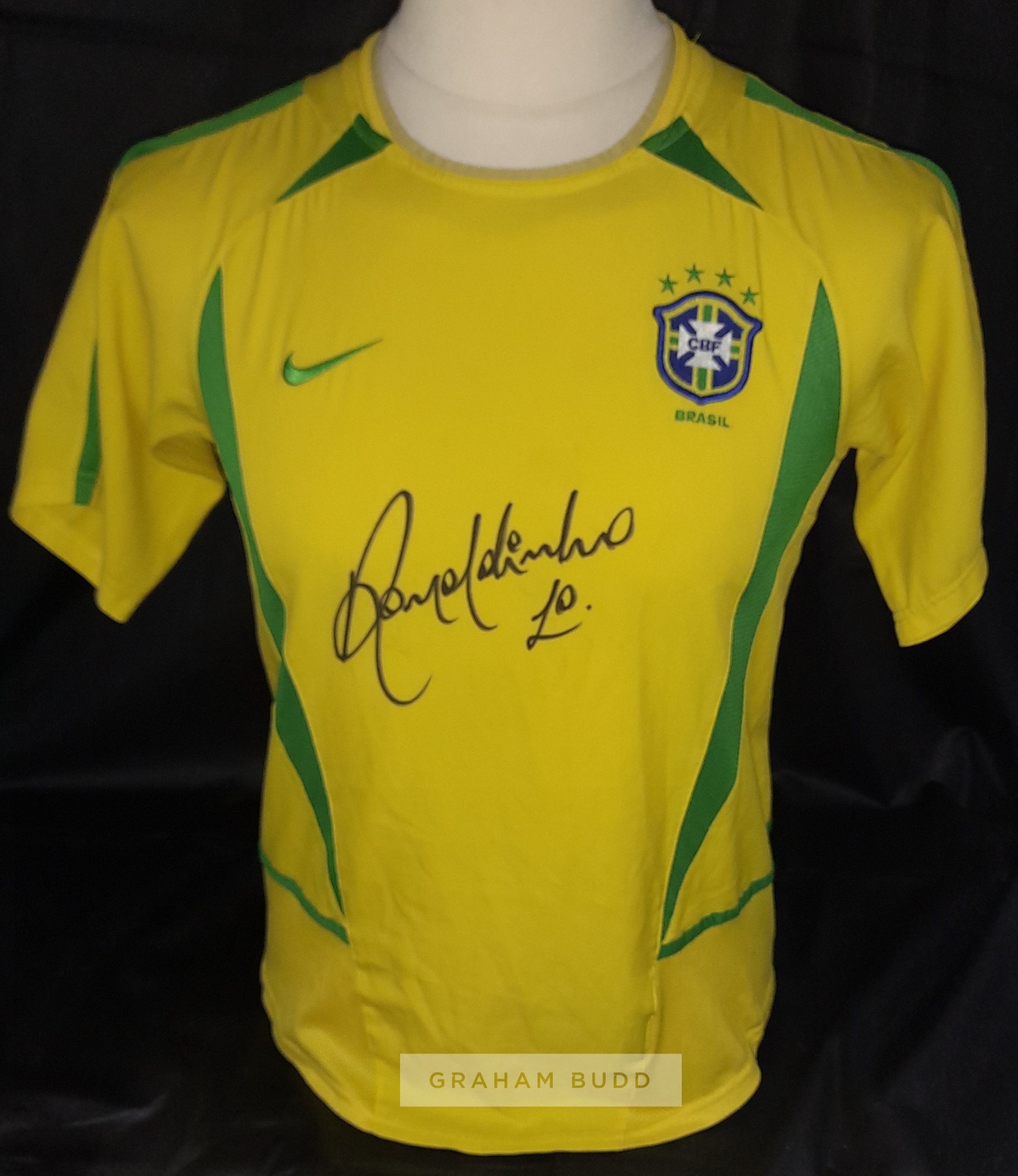 Brazil 2002 World Cup replica winning jersey signed by the enigmatic Ronaldinho boldly across