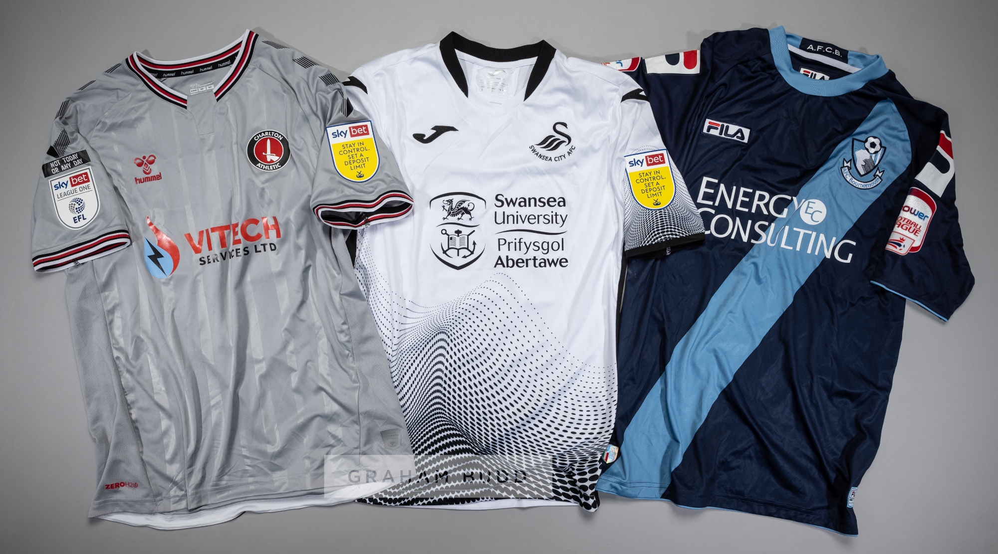 Three EFL players' jerseys, comprising George Byers signed white and black Swansea City no.28 home