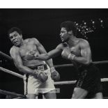 Three signed boxing print canvases, comprising Leon Spinks signed image of the bout v Muhammad