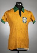 An autographed yellow and green Brazil no.19 home jersey, circa 1962, Ceppo, short-sleeved with