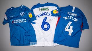 Three signed Portsmouth FC jersey's, comprising David Wheeler blue and white no.22 home jersey,
