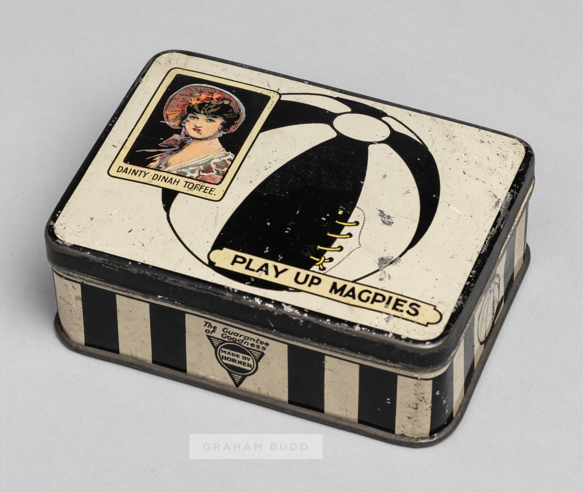 Dainty Dinah Toffee "Play Up Magpies" Newcastle United tin, circa 1900s, with black and white