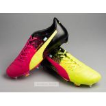 Arsenal and Argentina's Emiliano Martinez Puma Evopower football boots, yellow, black and pink