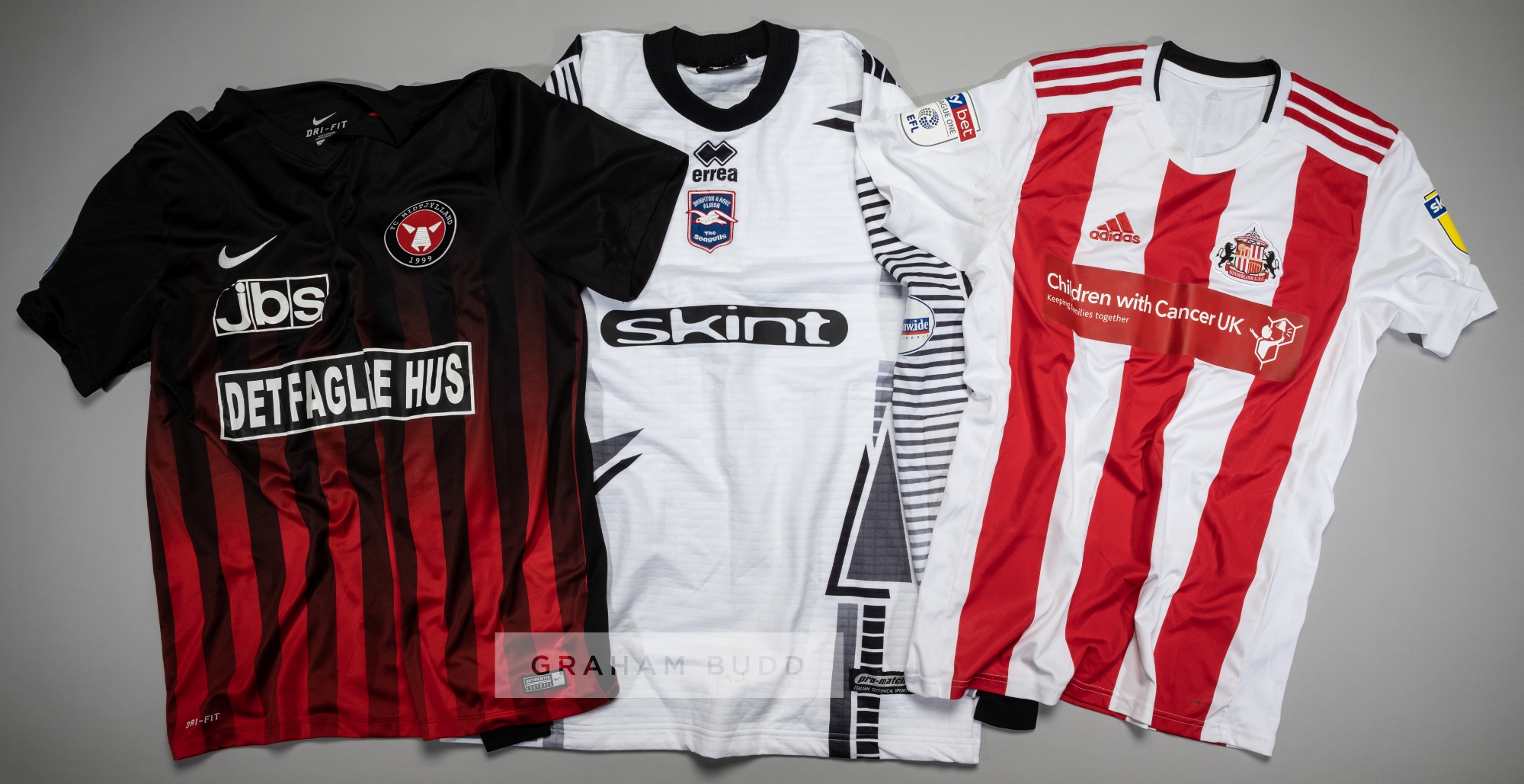 Three players' jerseys, comprising John Keeley signed white and black Brighton & Hove Albion no.29