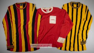 A group of three vintage football jerseys of unknown identity, comprising red no.11 long-sleeved