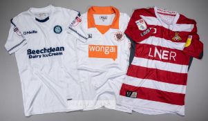 Three EFL players' jerseys, comprising Paris Cowan-Hall signed white Wycombe Wanderers no.12 third