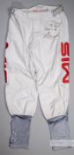 Jason Maguire signed race-worn jockey breeches, signed and dedicated TO NEV, BEST WISHES, J MAGUIRE,