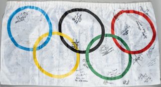 An Olympic Rings flag extensively signed by a selection of Great British Olympic medallist's and