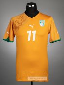 Didier Drogba orange Ivory Coast no.11 home jersey, circa 2010, Puma, short-sleeved with PUMA sleeve