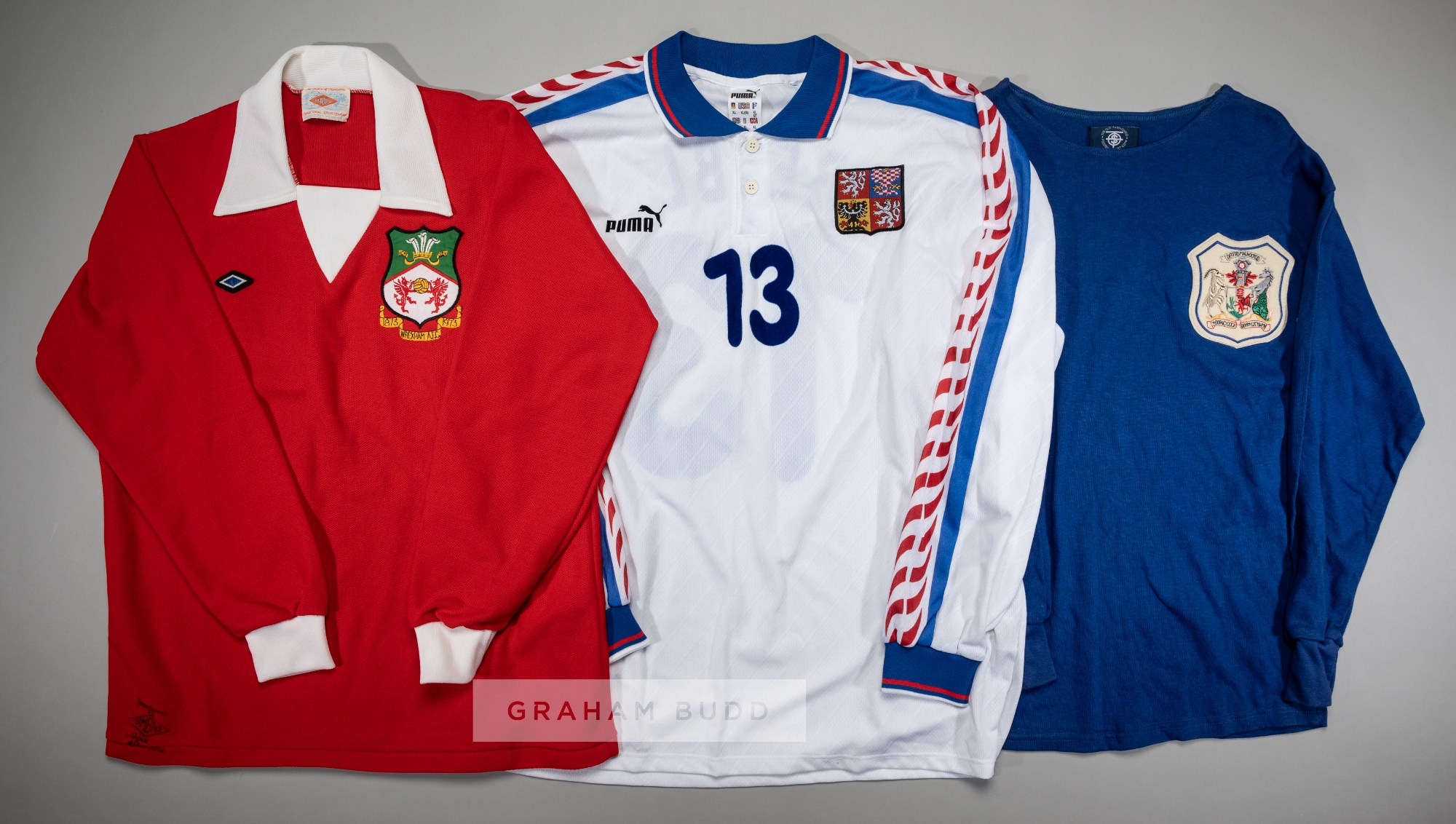 A collection of 12 replica jerseys, comprising blue Jens Jonbloed 1974 World Cup Netherlands no.8