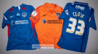 Three signed Portsmouth FC jersey's, comprising Callum Johnson orange no.2 third choice jersey,