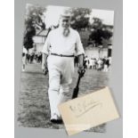 The signature of the cricketer W G Grace, the black ink signature on white paper, slightly