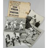 Four b & w press photographs of Roger Bannister, three action photographs and one with team, 15 by