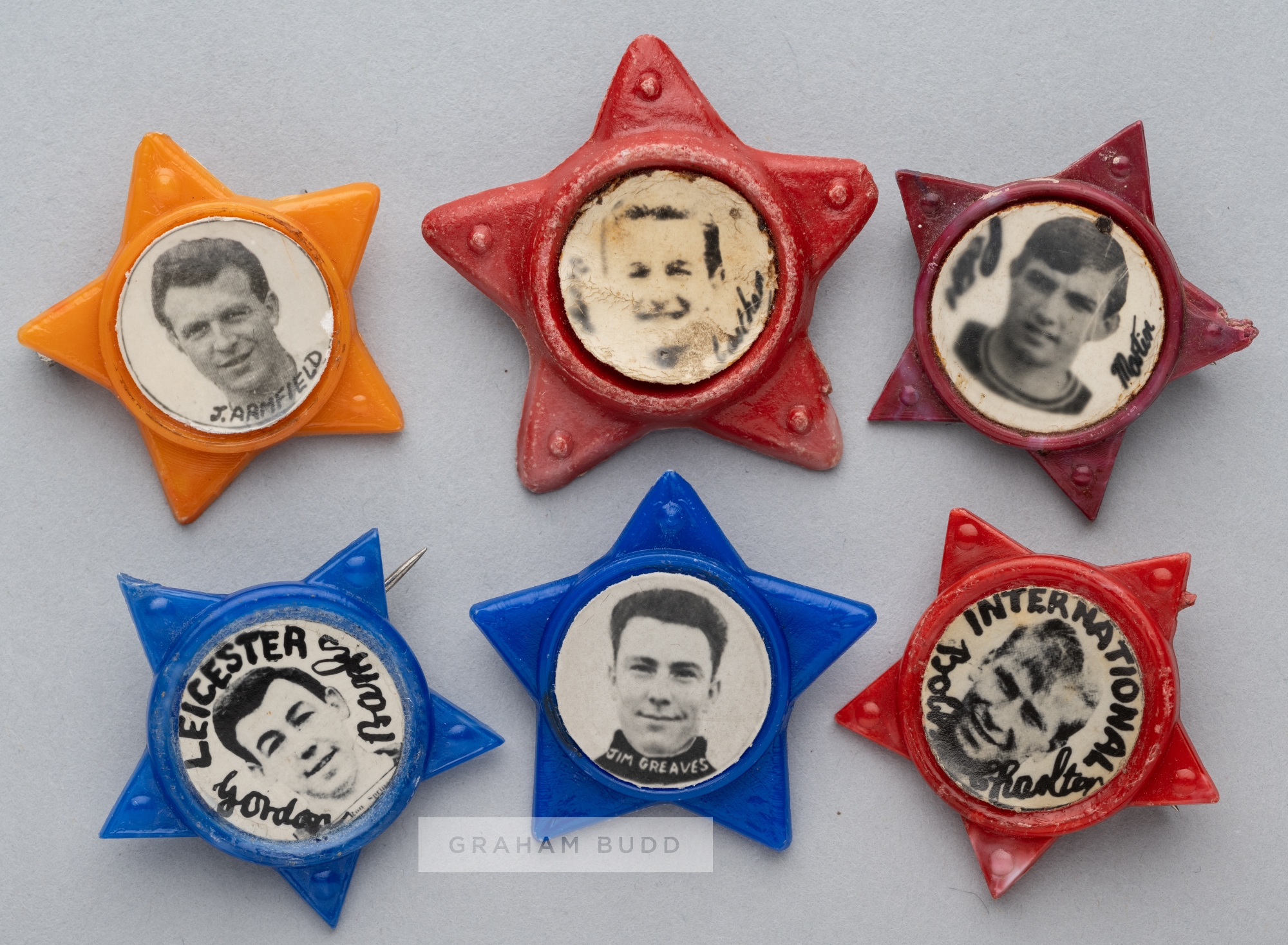 Six rare celluloid star-shaped badges featuring players from the England 1966 World Cup winning