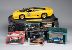 Over 40 model cars covering a variety of scales and several Manufacturers Including 6 x Hotwheels