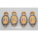 Four identical Football Association badges issued to F.A. official Charles James Hughes (1853-