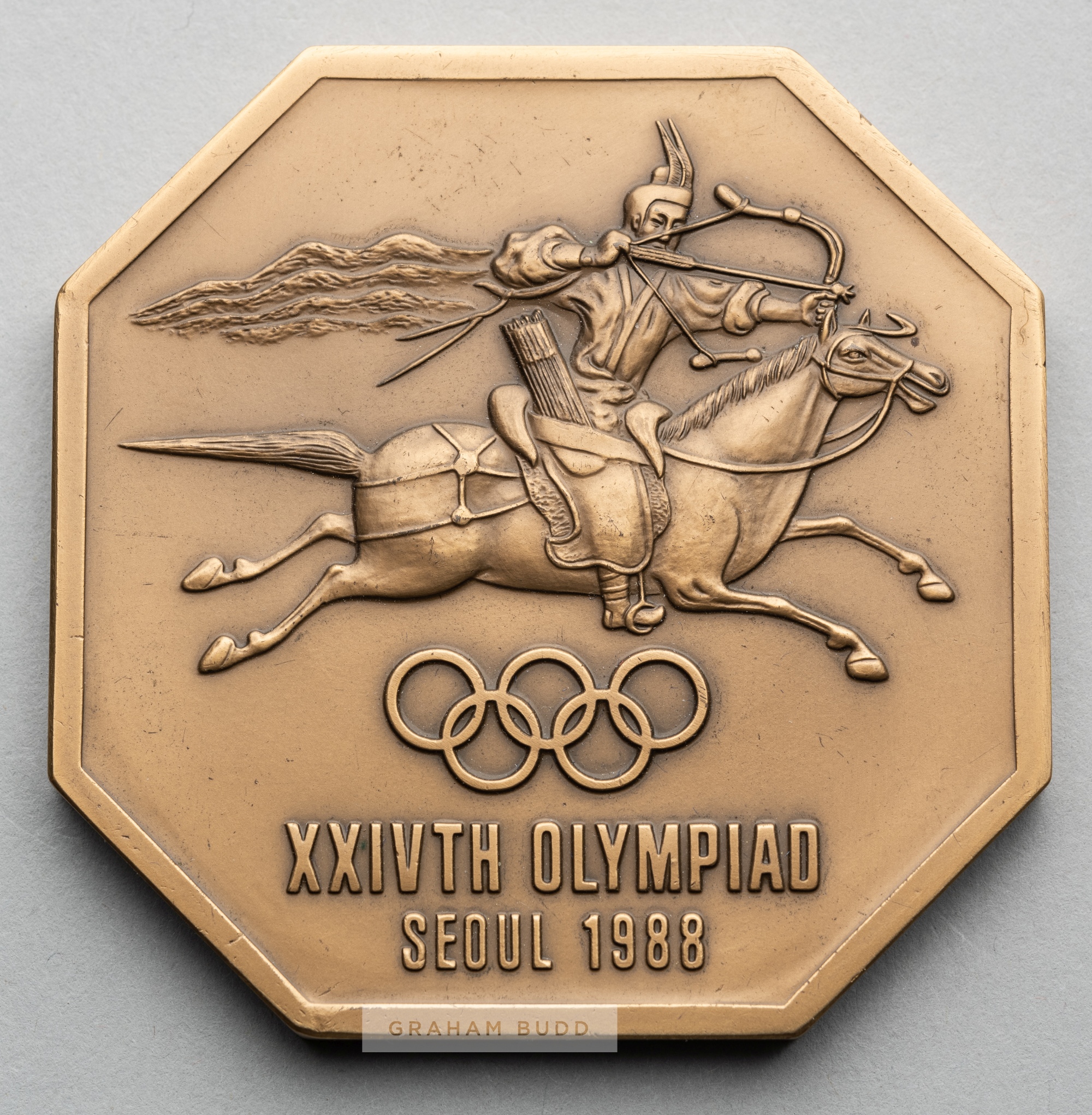 Seoul 1988 Olympic Games volunteer's participation medal, bronze octagonal, obverse depicting a