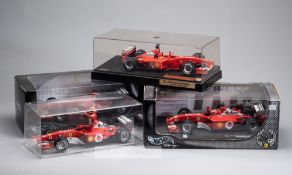 Group of thirteen Ferrari 1:18 scale model cars, predominantly Hotwheels all in original boxes,