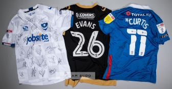 Three signed Portsmouth FC jersey's, comprising: a Curtis Main squad signed white no.14 away jersey,