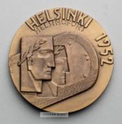 Two Olympic Games participant's medals for Helsinki 1952 and Melbourne 1956, comprising Helsinki