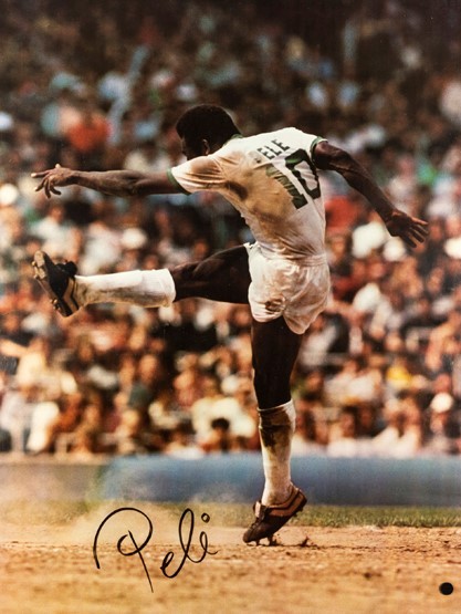 Pele signed large and impressive colour New York Cosmos photograph, 38 by 29in. (97 by 74cm.),