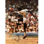 Pele signed large and impressive colour New York Cosmos photograph, 38 by 29in. (97 by 74cm.),