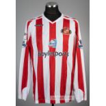 Dwight Yorke signed red and white striped Sunderland AFC no.19 home jersey, season 2007-08, Umbro,