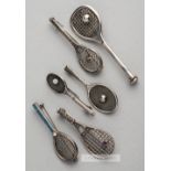 Six English and Continental silver tennis racquet brooches,  two with silver tennis ball on strings,