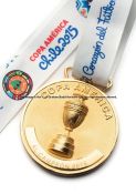 Chile 2015 Copa America winner’s medal, in gilt-metal, circular form, inscribed COPA AMERICA AL