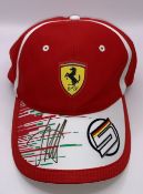 Sebastian Vettel signed Ferrari Collection, including signed Ferrari Pit Crew Shirt, signed