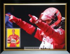 Michael Schumacher seven times F1 World Champion signed and framed display, measuring 69 by 55cm.,