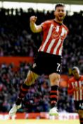 Southampton collection of seven signed photographs, including Stuart Armstrong, Danny Ings, Nathan